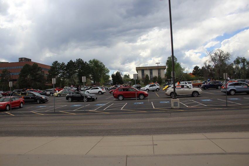 Lakewood High School's parking lot was packed with cars that belong to 2020 graduates and their families. Many seniors honked their car horns as they drove by their teachers.